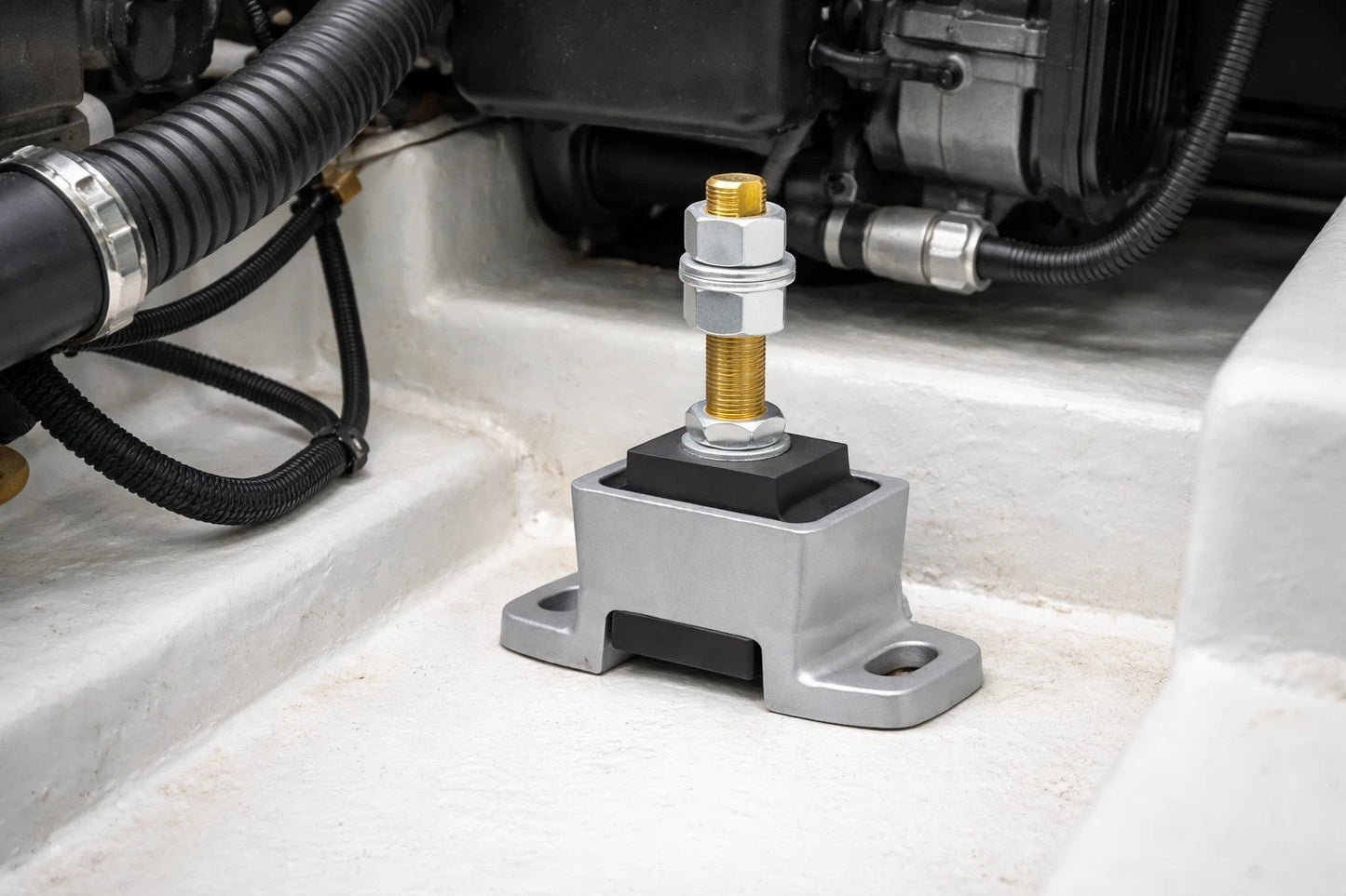 Novibrasyon Marin engine mount for Yanmar 4LHA-STE, 4LHA-HTP, 4LHA-DTP, 4LHA-STP engines. Silver aluminum base with black rubber vibration dampener and gold threaded bolt.