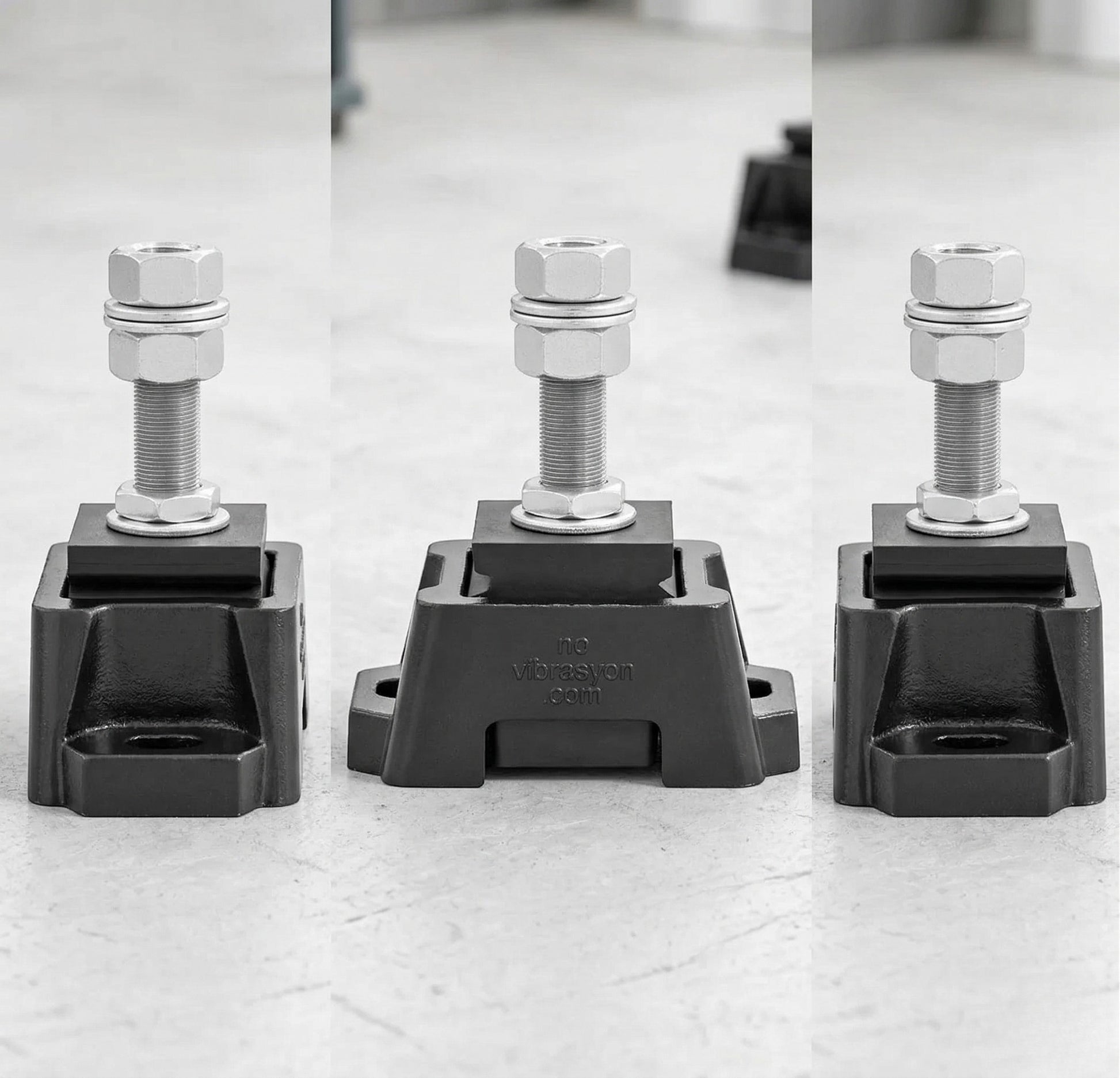 Novibrasyon Marine Engine Mount for Cummins diesel engines, black aluminum body with threaded bolt and nuts.